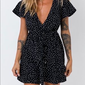 Black polka dot mini dress from Princess Polly